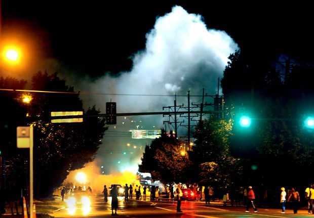 Tear gas fired, demonstrators cleared in Ferguson